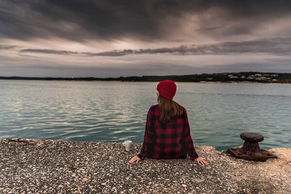 young woman with mug of coffee