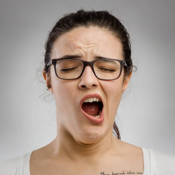 Beautiful woman yawning — Stock Photo, Image