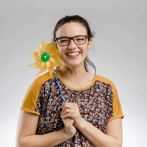 Playing with a windmill — Stock Photo, Image