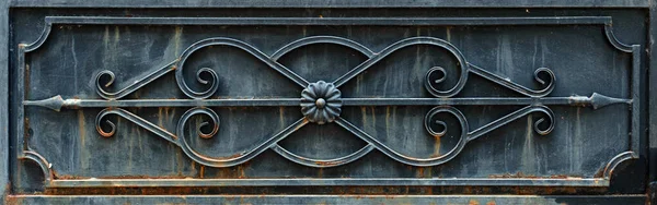 Rectangular element of black rusted forged fence