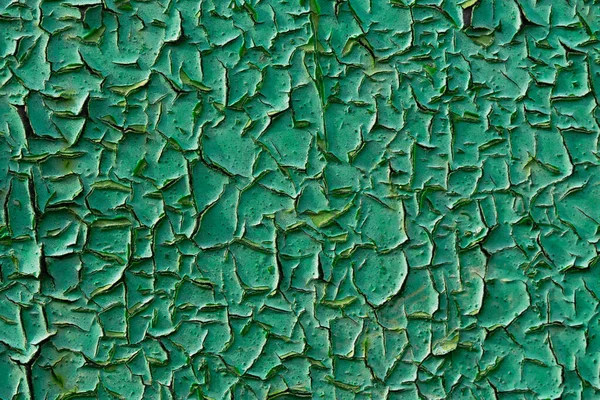Старый зеленый пилинг краски крупным планом фоне — стоковое фото