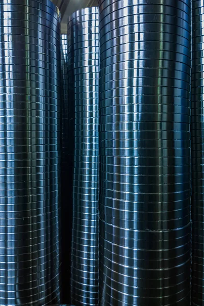 Fondo de fabricación industrial de columnas de anillos metálicos brillantes después de la operación de torneado CNC —  Fotos de Stock