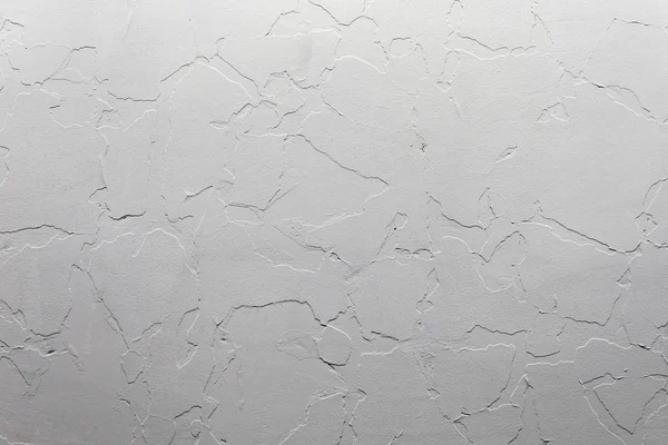 Astratto sfondo bianco discreto e texture. Un muro di intonaco con vecchio strato incrinato sotto uno nuovo . — Foto Stock