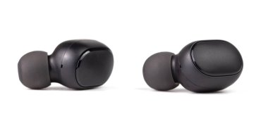 two black wireless earbuds isolated on white background - close-up with selective focus