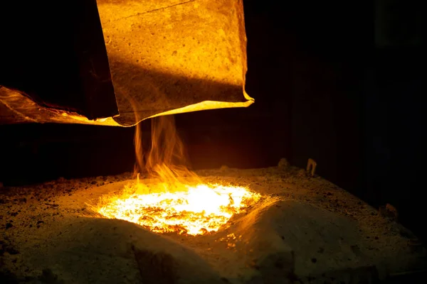 Metallurgical furnace with exhaust hood and melting metal with slag and vapor — Stock Photo, Image