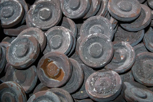 Heap of grey steel round forgings - close-up natural heavy industrial pattern with selective focus — Stock Photo, Image