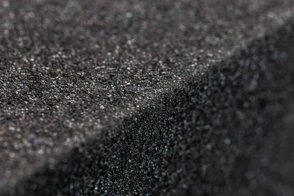 Közelkép a szélén fekete gumi hab szivacs tégla — Stock Fotó