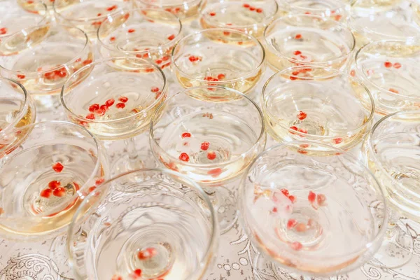 Champagne with pomegranate — Stock Photo, Image