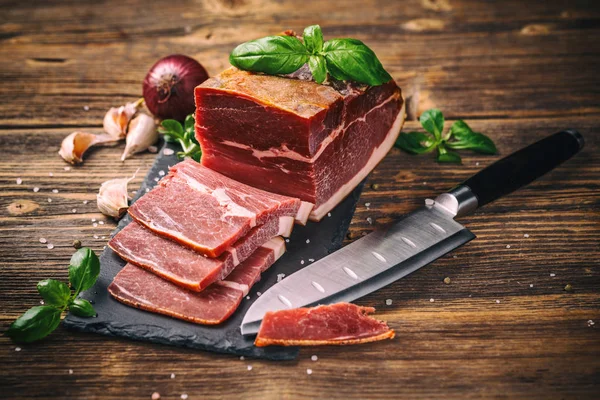 Slices of prosciutto — Stock Photo, Image