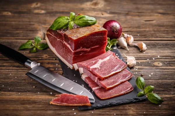 Slices of prosciutto — Stock Photo, Image