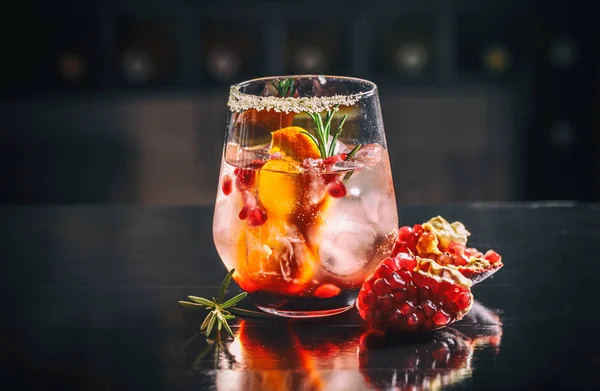 Glass of pomegranate and orange juice — Stock Photo, Image