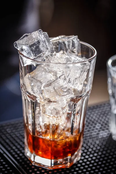 Glass with ice cubes — Stock Photo, Image