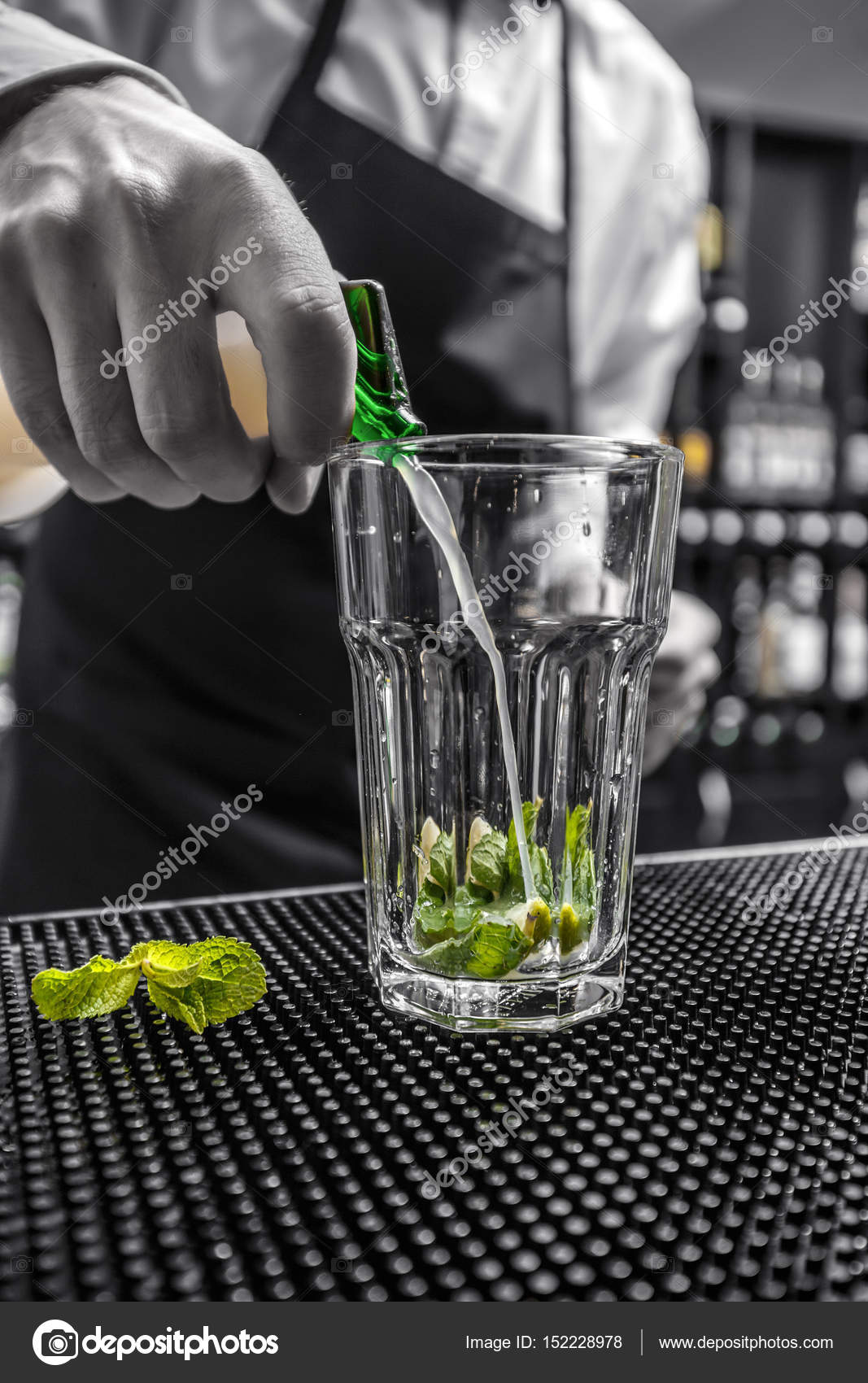 Bartender is pouring lime juice — Stock Photo © grafvision 152228978