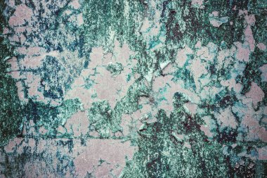 Paslı mavi boyanmış metal duvar