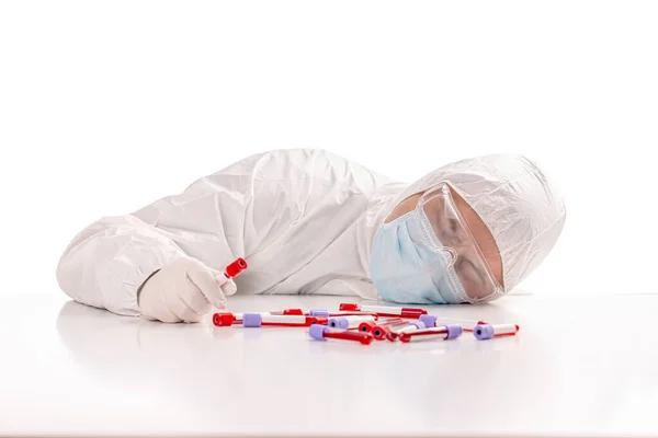 Exhausted scientist sleeping in laboratory — Stock Photo, Image