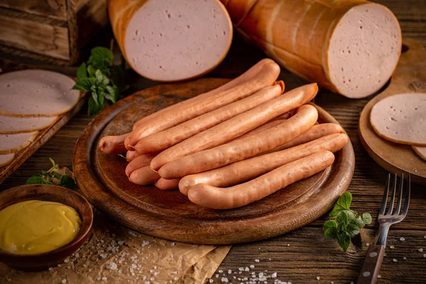 Fresh sausages served with mustard — Stock Photo, Image