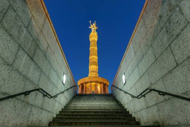The Victory Column in Berlin at night clipart