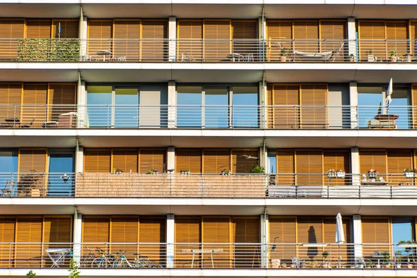 Balconies of a modern orange building — Stock Photo, Image