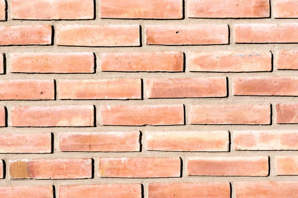 Sfondo da un muro di mattoni rosso — Foto Stock