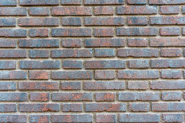 Fondo Una Pared Ladrillo Rojo Oscuro —  Fotos de Stock