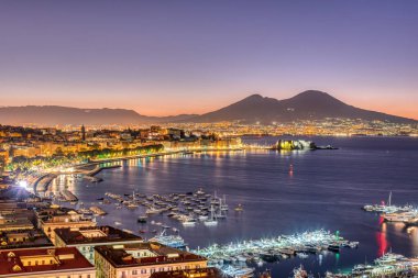 The Gulf of Naples with Mount Vesuvius before sunrise clipart