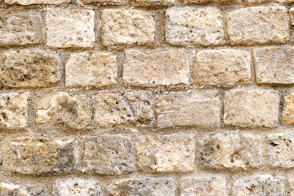 Achtergrond Van Een Ruwe Bruine Natuurstenen Muur — Stockfoto