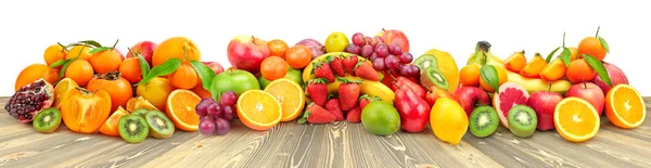 Ποικιλία φρούτων και λαχανικών σε ξύλινο τραπέζι απομονωμένο σε λευκό — Φωτογραφία Αρχείου