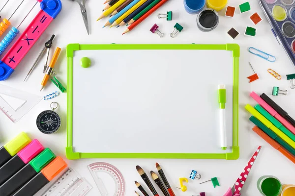 School supplies with flipchart on white. — 스톡 사진