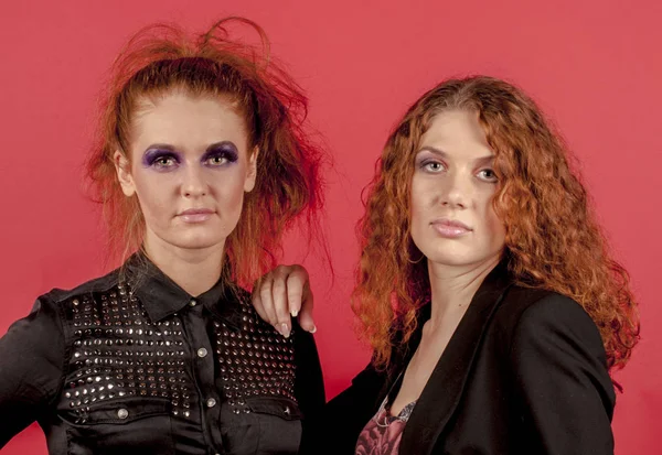 Two young red-haired girls in bright make-up — Stock Photo, Image