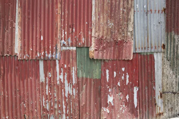 Corrugated red metal wall background texture — Stock Photo, Image