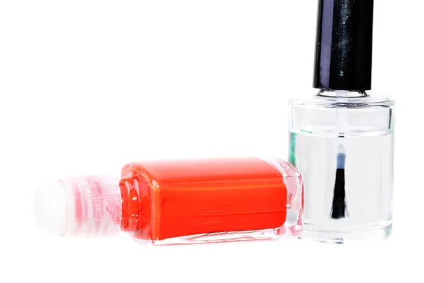 Macro shot of several nail paint bottles over white — Stock Photo, Image