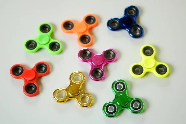 Grupo de nerviosismo spinner estrés aliviar juguete colorido — Foto de Stock