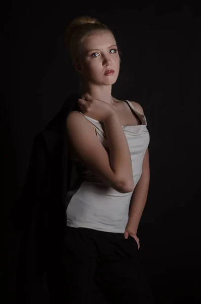 Beautiful blonde woman in a severe  business suit — Stock Photo, Image