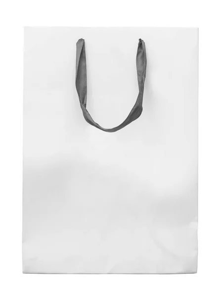 Big white paper bag with satin ribbon handles — Stock Photo, Image