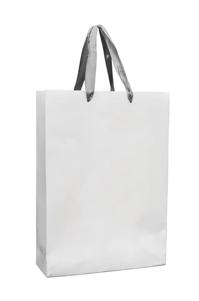 Big white paper bag with satin ribbon handles — Stock Photo, Image