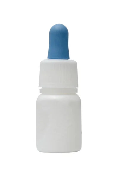 Frasco de plástico branco com uma pipeta para gotas de nariz — Fotografia de Stock