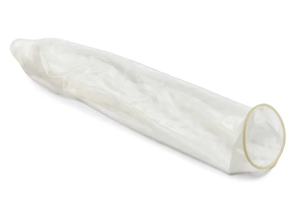 Використовується бежевий латекс презерватив — стокове фото