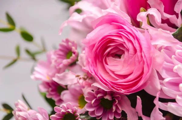 Delicate fresh bouquet of fresh flowers with pink Ranunculus. — Stock Photo, Image