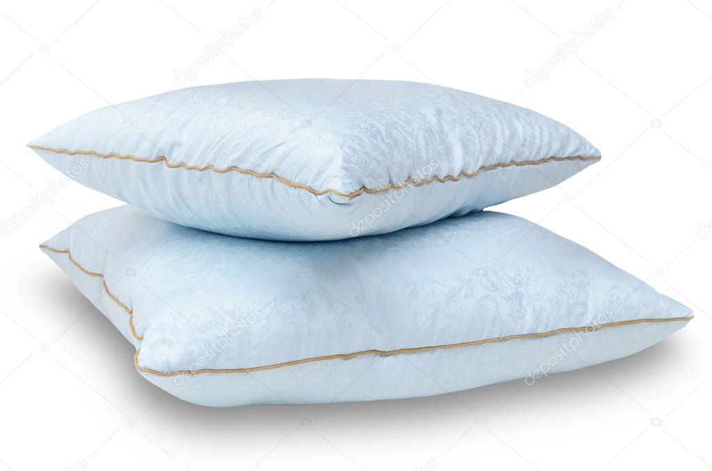 Two blue feather pillows lie one on one (group), isolated on whi