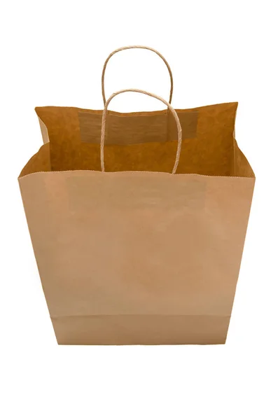 Brown paper bag from kraft paper. Open package. Shopping bag iso — Stock Photo, Image