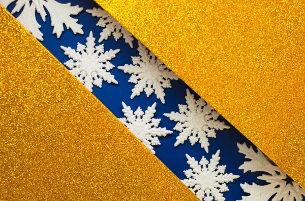 Combinazione di oro e blu con fiocchi di neve di pizzo bianco, h lucido — Foto Stock