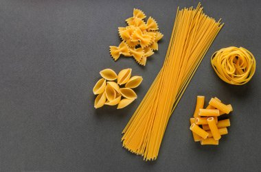 Postcard, background - italian traditional pasta on a gray backg