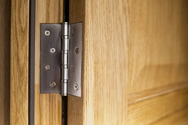 door hinges Aluminum on oak door