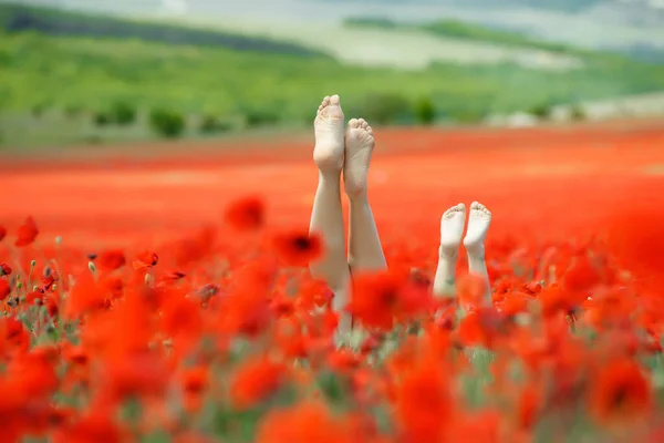 Beautiful legs on the nature in the field. — Stock Photo, Image