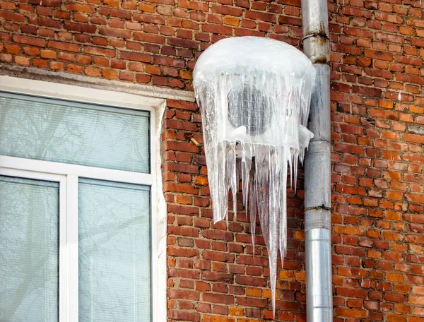 Air Conditioner Covered Icicles Brick Wall House — Stock Photo, Image