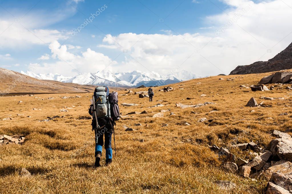 Group of hikers in Tien Shan mountains, Kyrgyzstan.