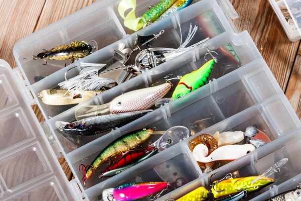 Fishing accessories on a wooden background. — Stock Photo, Image