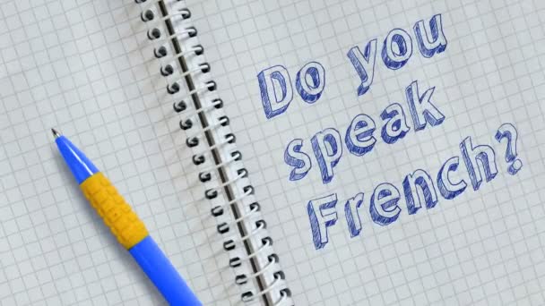 你会说法语吗 在笔记本上手写的文字和动画 — 图库视频影像