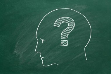 Human face with question mark inside. Illustration on blackboard.