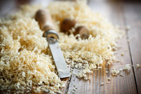 Woodworking tools. Chisel with sawdust . — Stock Photo, Image